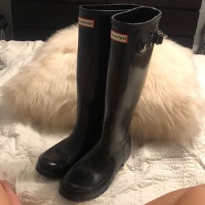 Tall black hunter rain boots